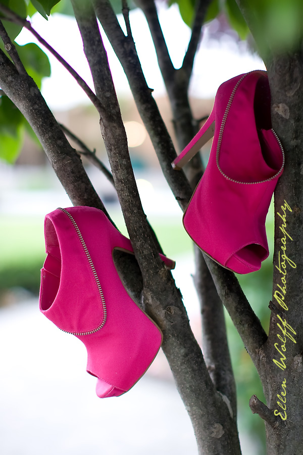fun photo of a pair of sweet 16 party platform shoes in fuschia